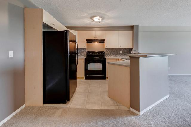 7204 - 304 Mackenzie Way Sw, Condo with 2 bedrooms, 1 bathrooms and 1 parking in Calgary AB | Image 9