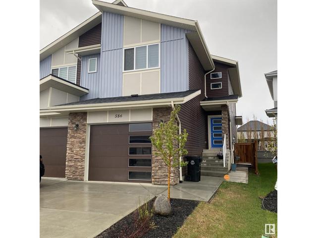 586 Kleins Cr, House semidetached with 3 bedrooms, 2 bathrooms and 2 parking in Leduc AB | Card Image