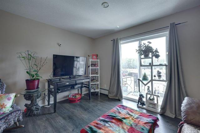 204, - 174 N Railway Street, Condo with 2 bedrooms, 2 bathrooms and 1 parking in Okotoks AB | Card Image