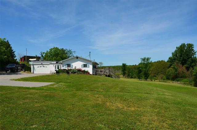 313 County Rd 121, House detached with 2 bedrooms, 1 bathrooms and 10 parking in Kawartha Lakes ON | Image 1