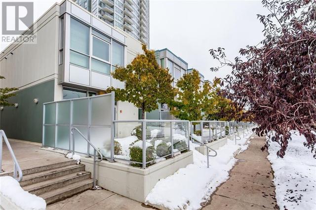 132, - 99 Spruce Place Sw, House attached with 2 bedrooms, 2 bathrooms and 2 parking in Calgary AB | Image 33