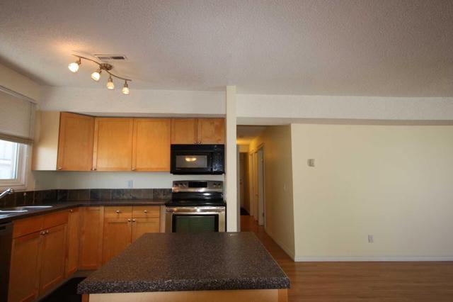 808 - 1540 29 Street Nw, Condo with 2 bedrooms, 1 bathrooms and 1 parking in Calgary AB | Image 8