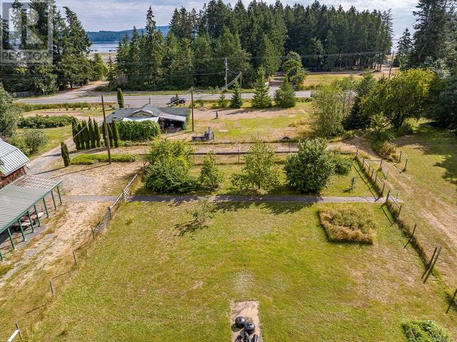 8185 Island Hwy S, House detached with 4 bedrooms, 4 bathrooms and 6 parking in Comox Valley A BC | Image 46