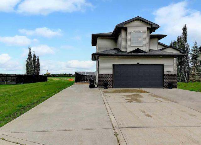 10212 93 Avenue, House detached with 5 bedrooms, 3 bathrooms and 6 parking in Sexsmith AB | Image 4