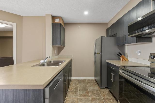 405 - 15 Saddlestone Way Ne, Condo with 2 bedrooms, 2 bathrooms and 1 parking in Calgary AB | Image 7