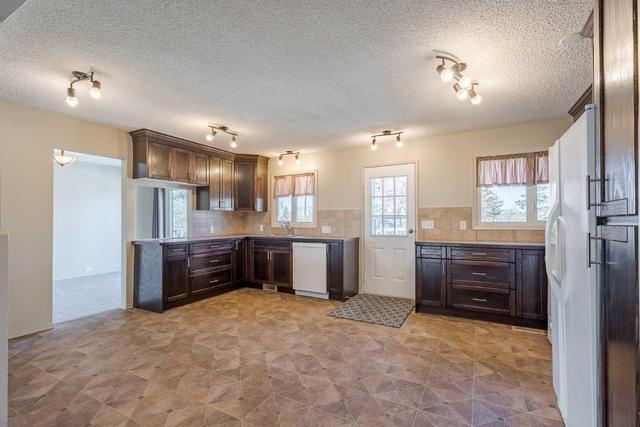 313 Main Street Nw, House detached with 6 bedrooms, 2 bathrooms and 5 parking in Airdrie AB | Image 6