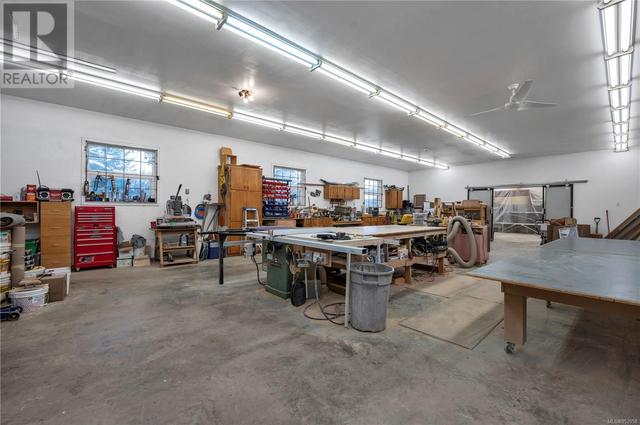 Workshop 30’ Wide x 70’ Long – 10’ Height •Fully Finished inside with 4 inch Concrete Slab Floor •Pro Lock Metal Roof  & Leaf Guard Gutters in Sept 2020 •WETT Certified Woodstove (Nov 2020) and | Image 84