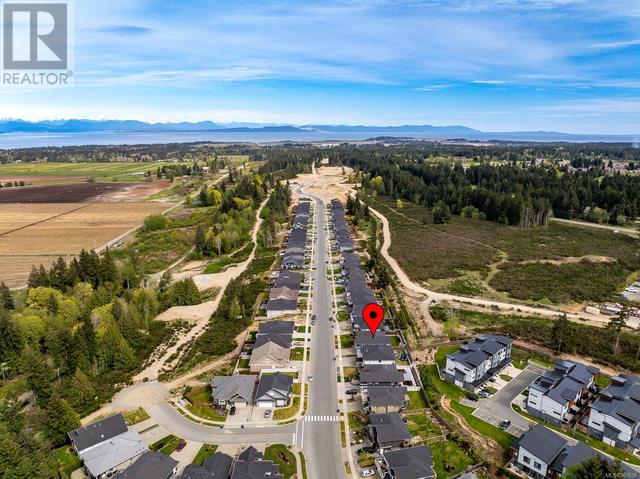 1315 Crown Isle Blvd, House detached with 4 bedrooms, 3 bathrooms and 5 parking in Courtenay BC | Image 53