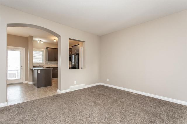 26 Ross Close, Home with 3 bedrooms, 1 bathrooms and 2 parking in Red Deer County AB | Image 4