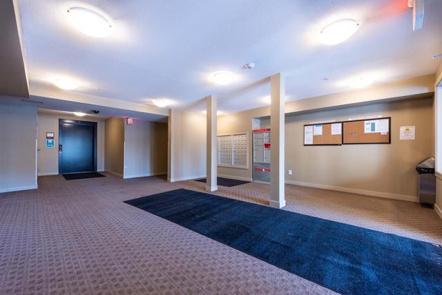 9105 - 403 Mackenzie Way Sw, Condo with 2 bedrooms, 2 bathrooms and 1 parking in Calgary AB | Image 2