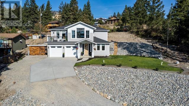 10290 Columbia Way, House detached with 4 bedrooms, 2 bathrooms and 6 parking in Central Okanagan West BC | Image 2