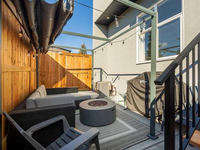1104 40 Street Sw, Home with 4 bedrooms, 3 bathrooms and 1 parking in Calgary AB | Image 12