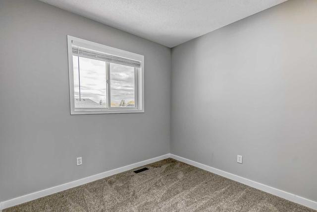 20 Woodside Circle Nw, House detached with 3 bedrooms, 2 bathrooms and 2 parking in Airdrie AB | Image 19