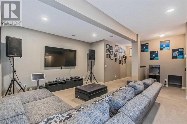 128 Mike Ralph Way Sw, House detached with 4 bedrooms, 3 bathrooms and 2 parking in Calgary AB | Image 38