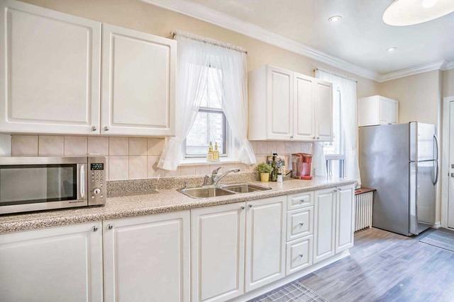 34 Rolyat St, House attached with 3 bedrooms, 2 bathrooms and 2 parking in Toronto ON | Image 3