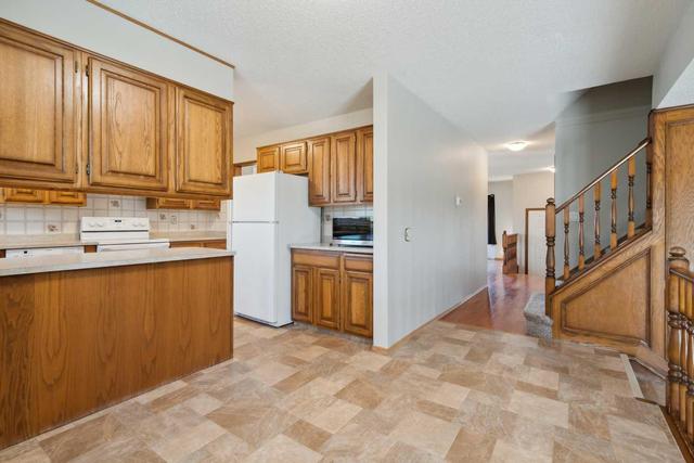 59 Springwood Crescent Se, House detached with 3 bedrooms, 2 bathrooms and 4 parking in Airdrie AB | Image 14