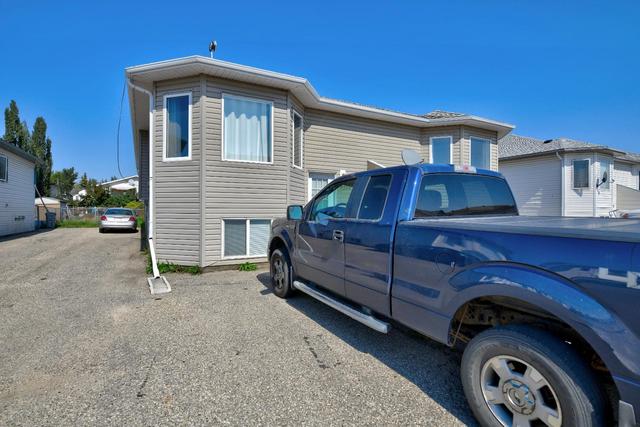9216 94a Avenue, Home with 5 bedrooms, 3 bathrooms and 4 parking in Grande Prairie AB | Image 24