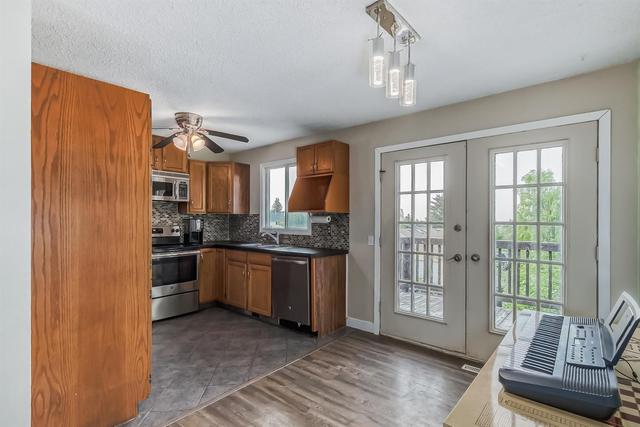 104 Macewan Drive Nw, House detached with 4 bedrooms, 2 bathrooms and 2 parking in Calgary AB | Image 10