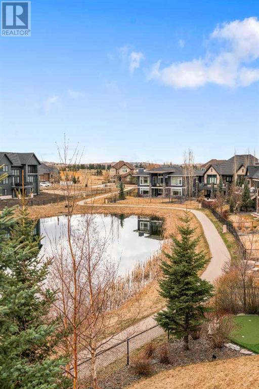 106 Waters Edge Drive, House detached with 4 bedrooms, 4 bathrooms and 4 parking in Foothills County AB | Image 47