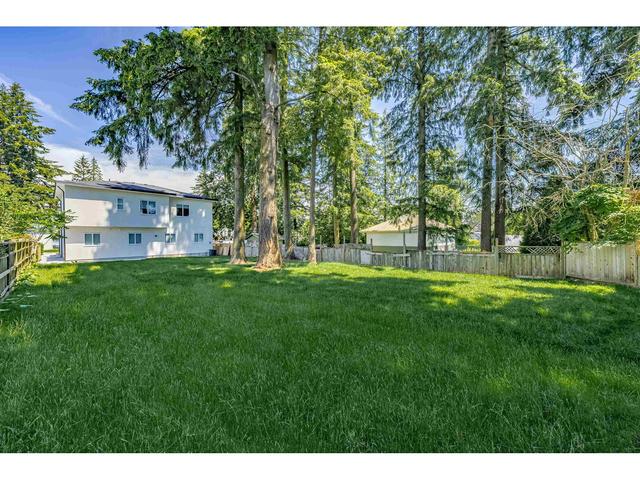 14076 Antrim Road, House detached with 10 bedrooms, 7 bathrooms and 8 parking in Surrey BC | Card Image