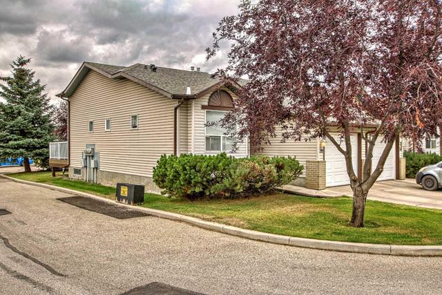 38 Tararidge Circle Ne, Home with 2 bedrooms, 2 bathrooms and 2 parking in Calgary AB | Image 1