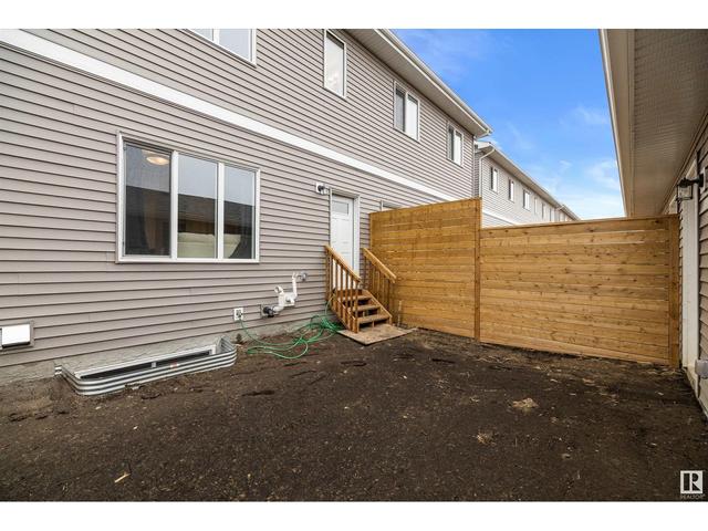 8515 96 Av, House attached with 3 bedrooms, 2 bathrooms and null parking in Morinville AB | Image 35