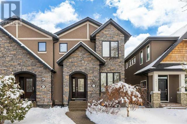2047 48 Avenue Sw, House semidetached with 3 bedrooms, 3 bathrooms and 2 parking in Calgary AB | Image 1