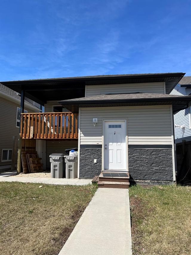 11542 76 Avenue, House detached with 5 bedrooms, 2 bathrooms and 4 parking in Grande Prairie AB | Image 1
