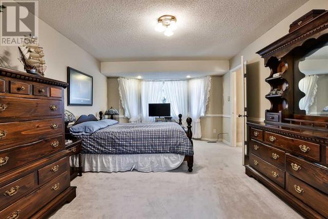 48 Tudor Crescent S, House detached with 4 bedrooms, 2 bathrooms and 4 parking in Lethbridge AB | Image 25