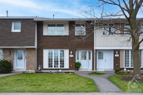1244 Pebble Road, Townhouse with 4 bedrooms, 2 bathrooms and 1 parking in Ottawa ON | Card Image