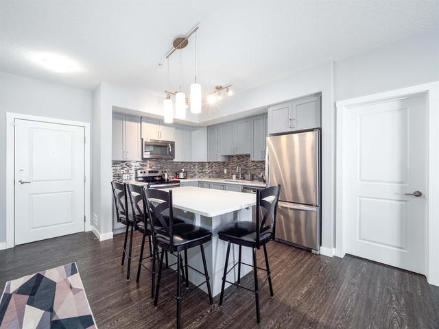 1110 - 3727 Sage Hill Drive Nw, Condo with 2 bedrooms, 2 bathrooms and 1 parking in Calgary AB | Image 3