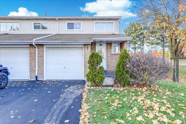 22 Enmount Dr, Townhouse with 3 bedrooms, 2 bathrooms and 2 parking in Brampton ON | Image 1