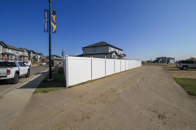 76 Latoria Court, Home with 3 bedrooms, 2 bathrooms and 3 parking in Red Deer County AB | Image 44