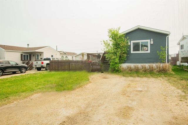 10605 98a Street, House detached with 3 bedrooms, 2 bathrooms and 4 parking in Grande Prairie County No. 1 AB | Image 1