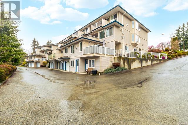 206 - 1150 Walkem Rd, House attached with 2 bedrooms, 2 bathrooms and 1 parking in Ladysmith BC | Image 24