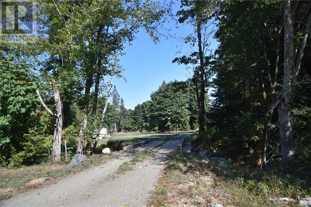 8991 Island Hwy S, House detached with 2 bedrooms, 1 bathrooms and 10 parking in Comox Valley A BC | Image 45