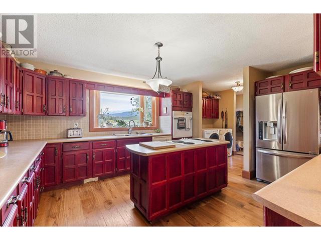 656 Curtis Road, House detached with 5 bedrooms, 3 bathrooms and 12 parking in Kelowna BC | Image 17
