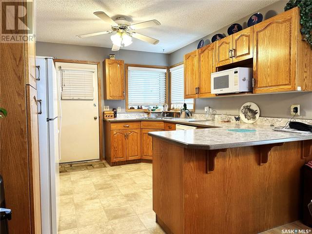1005 6th Avenue, House attached with 2 bedrooms, 3 bathrooms and null parking in Humboldt SK | Image 11
