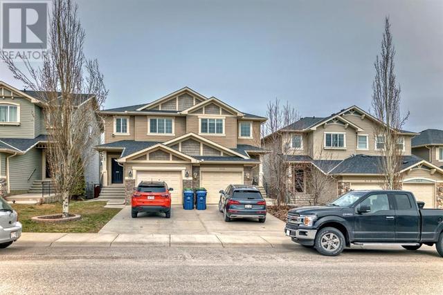 516 Panatella Square Nw, House semidetached with 3 bedrooms, 2 bathrooms and 2 parking in Calgary AB | Image 44