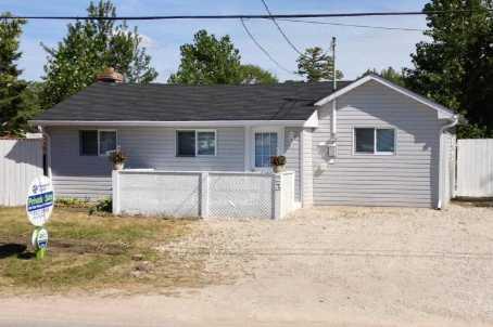 23 Dunkerron Ave, House detached with 2 bedrooms, 1 bathrooms and 6 parking in Wasaga Beach ON | Image 1