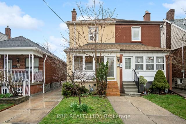 524 Lauder Ave, House semidetached with 3 bedrooms, 2 bathrooms and 2 parking in Toronto ON | Image 1