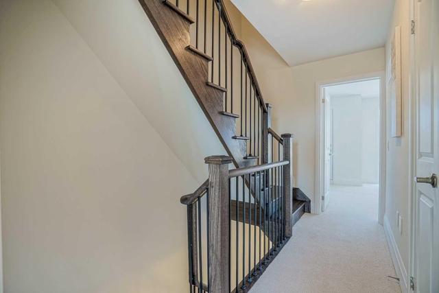 61 Kenneth Wood Cres, House attached with 4 bedrooms, 4 bathrooms and 1 parking in Toronto ON | Image 14