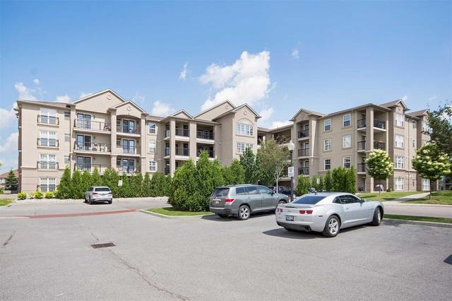 407 - 1380 Main St E, Condo with 2 bedrooms, 1 bathrooms and 1 parking in Milton ON | Image 1