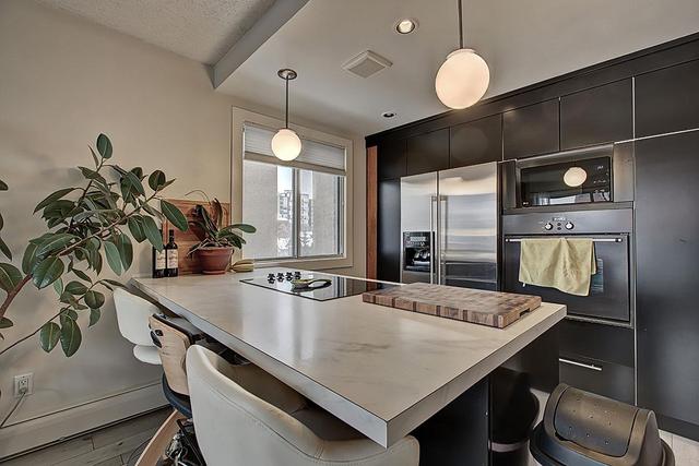 404 - 235 15 Avenue Sw, Condo with 2 bedrooms, 2 bathrooms and 1 parking in Calgary AB | Image 3