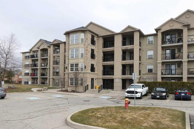 405 - 1479 Maple Ave, Condo with 2 bedrooms, 1 bathrooms and 1 parking in Milton ON | Image 1