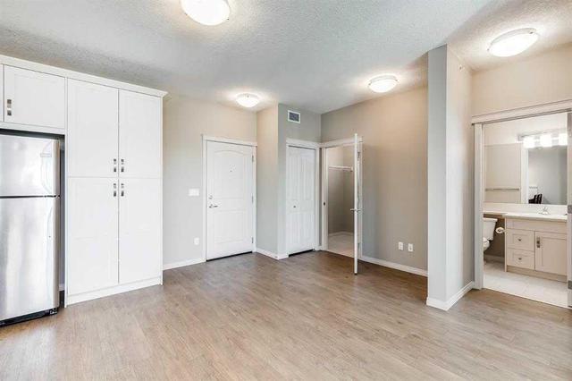 1407 - 522 Cranford Drive Se, Condo with 2 bedrooms, 2 bathrooms and 1 parking in Calgary AB | Image 6