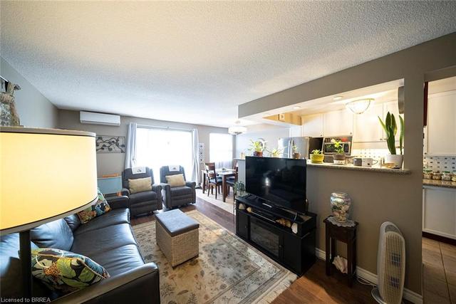 302 - 793 Colborne Street, House attached with 2 bedrooms, 1 bathrooms and 1 parking in Brantford ON | Card Image