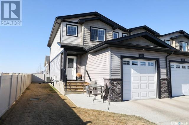 601 - 2 Savanna Crescent, House attached with 3 bedrooms, 4 bathrooms and null parking in Pilot Butte SK | Image 1