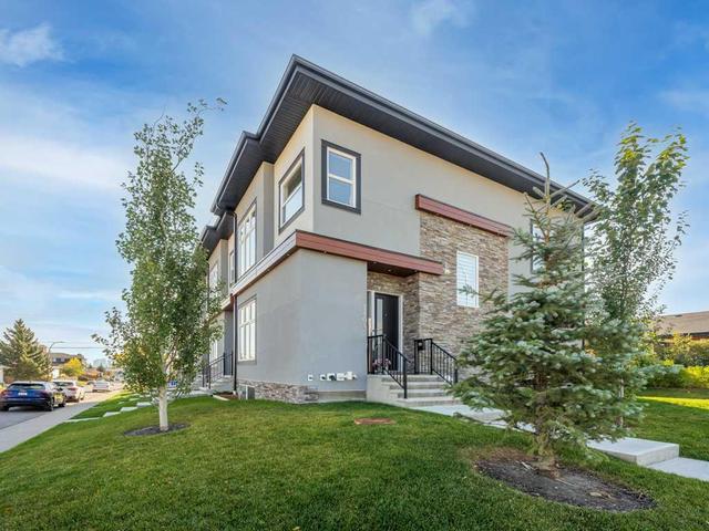 1104 40 Street Sw, Home with 4 bedrooms, 3 bathrooms and 1 parking in Calgary AB | Image 2