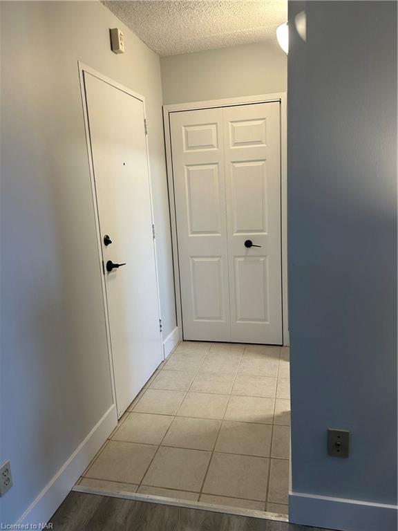 Front entrance with entry closet | Image 12